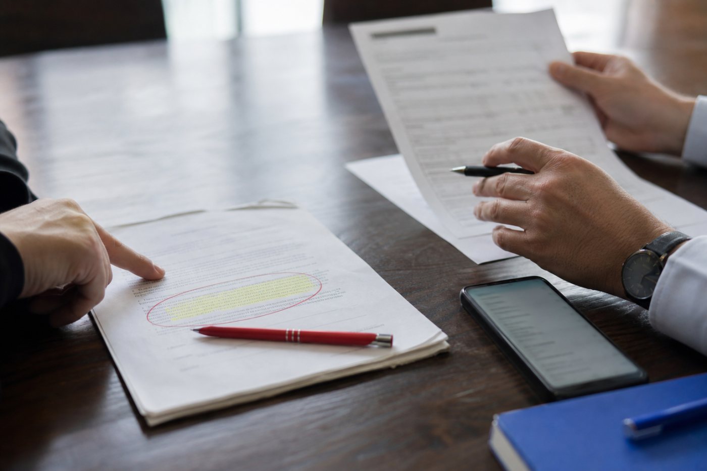 A founder and counsel check a closing-based introducer fee against the named broker-dealer registration before approving payment.