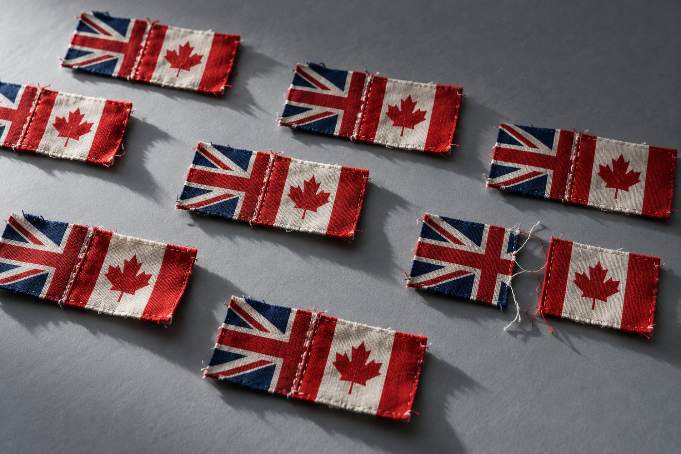 UK and Canadian flags joined at a matching seam to represent work on interoperable AI security standards