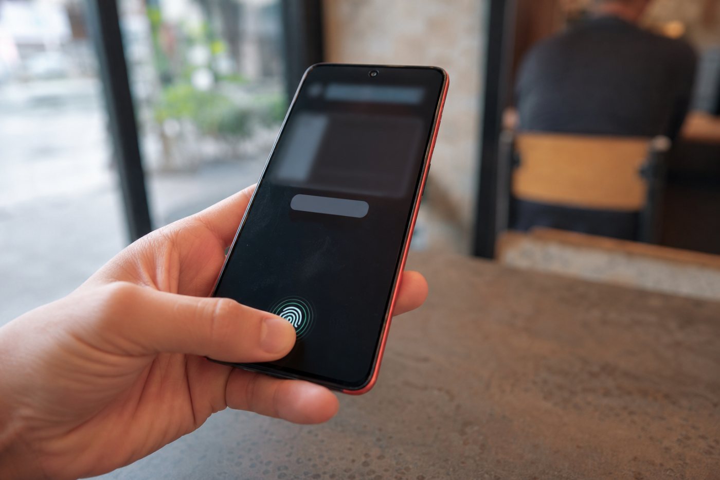 Android Identity Check requires biometric verification for a sensitive change outside a trusted place.