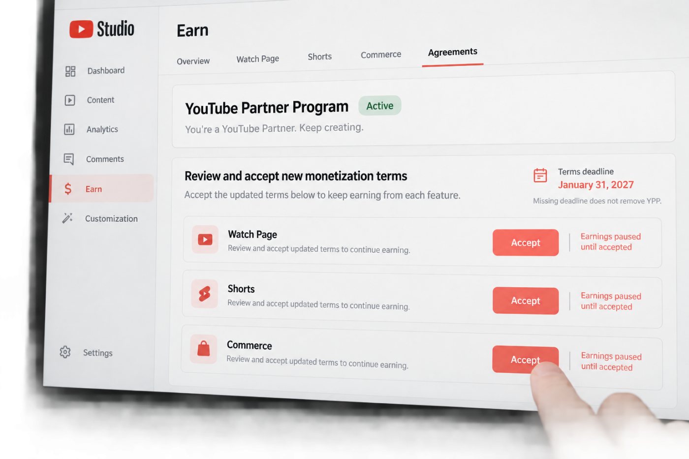 A YouTube partner reviews monetization modules before the January 31, 2027 contract deadline.