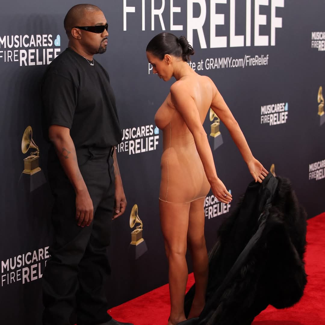 Censori was initially wearing a large fur coat before debuting her sheer ensemble 