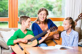Music and Parenting: Tips for Balancing Safety and Support at Your Child’s First Concert