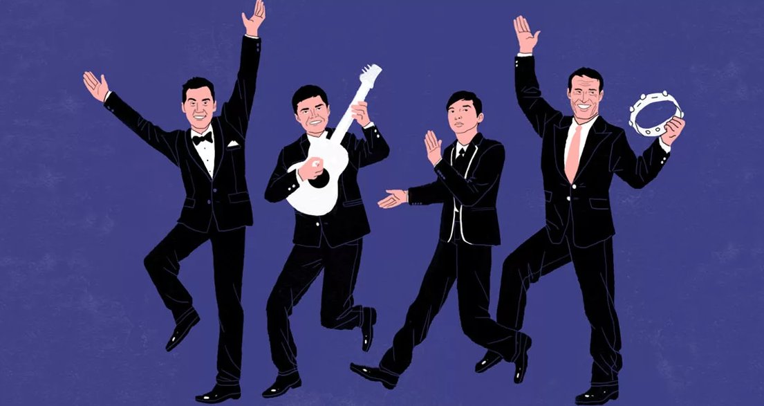 Мужчина в черном смокинге играет на гитаре - стильная студийная фотография.