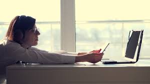 "Close-up portrait of an adult female person, focusing on her head and face."