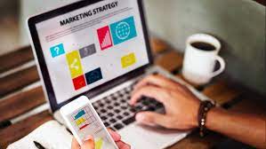 "Modern laptop computer on desk with cup, showcasing electronic gadgets and technology."