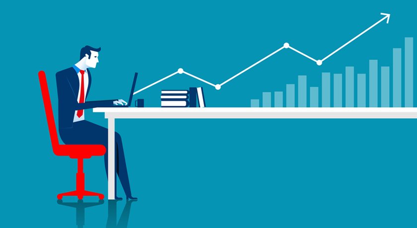 Мужчина за столом в мебельном магазине, ведет разговор. Работник проводит собеседование.