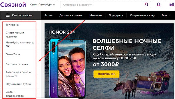 Человек собирается сфотографировать свою собаку на фоне электроники и телефона.
