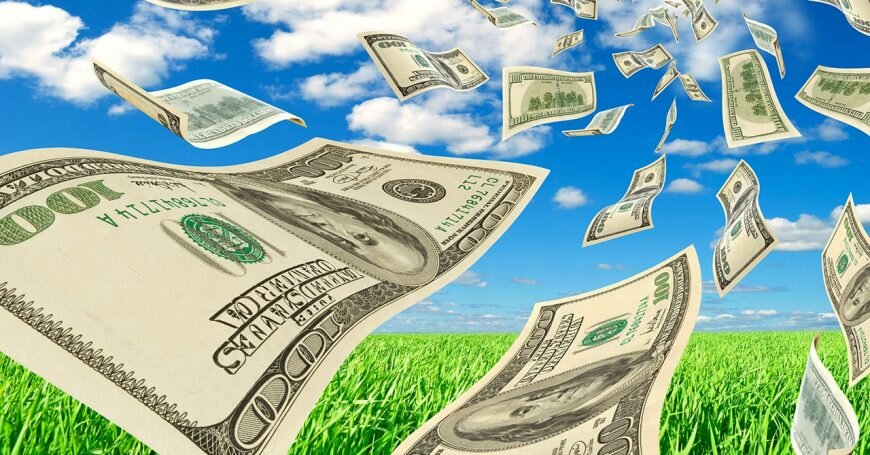 Доллары - изображение наличных на денежной бумаге, символизирующей богатство.