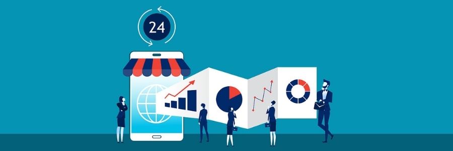 "Person holding a stylish handbag adorned with logo and accessories."