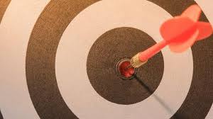 "Game room with darts, smoke pipe, disks, ping pong paddle, and rackets."