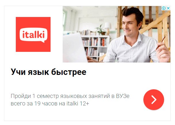 Фотография человека в библиотеке, читающего книгу, сосредоточенного на странице.