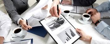 "Close-up of a coffee cup on a table indoors with text, beverage concept"