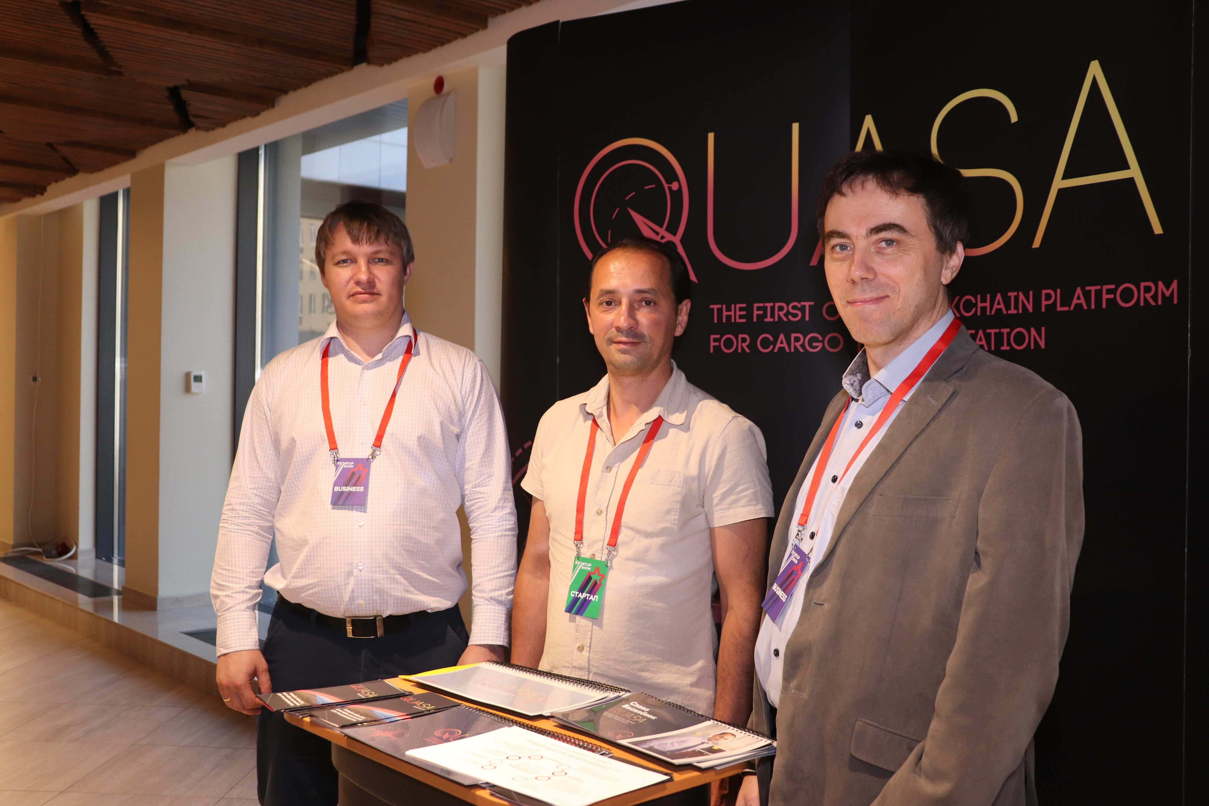 "Adult male woodworker wearing a belt, focused on plywood in interior design."