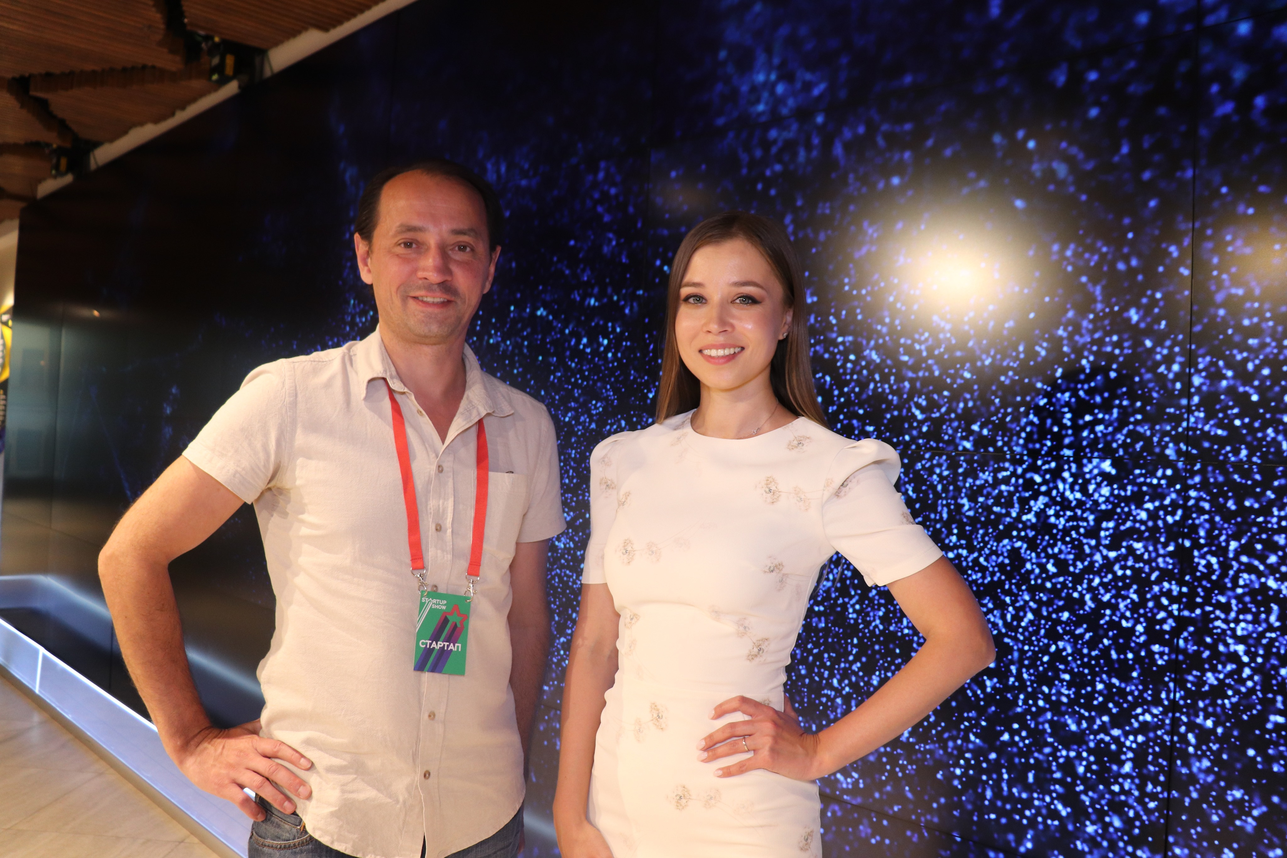 "Formal wear evening dress and blouse on adults, male and female models."